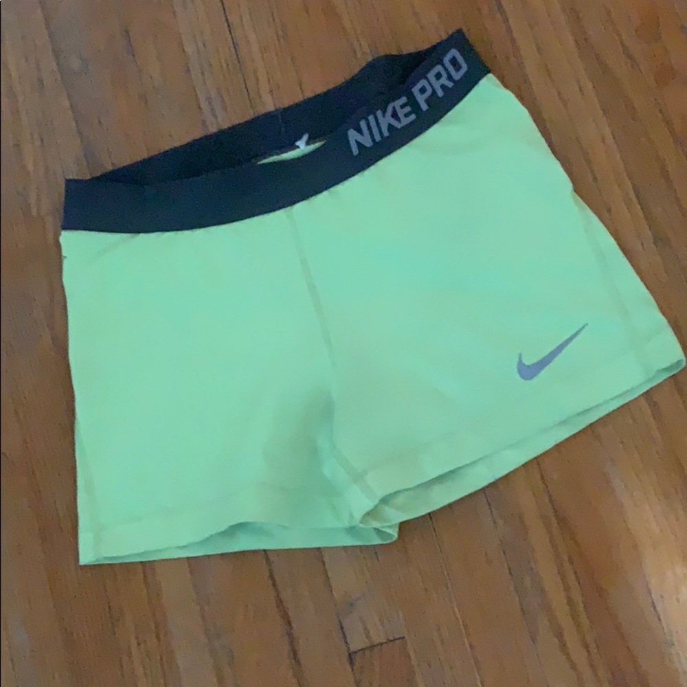 Yellow Nike dri-fit shorts
